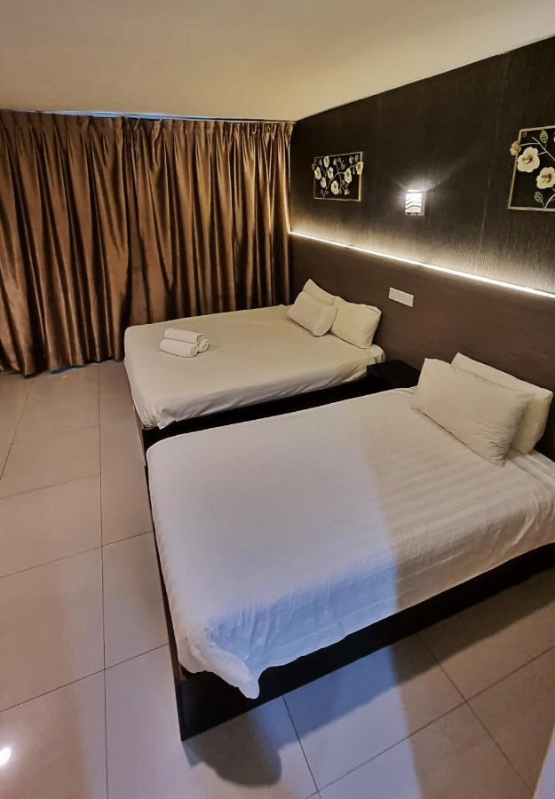 One Point Hotel Кучинг Экстерьер фото