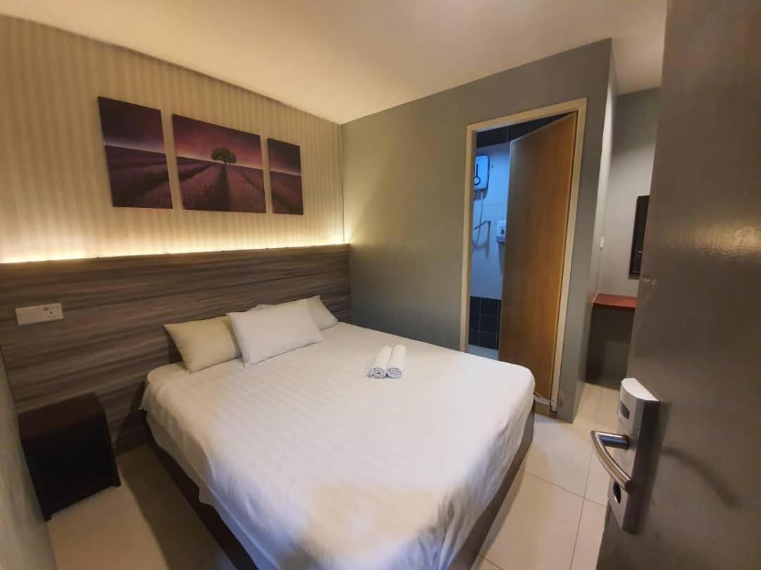 One Point Hotel Кучинг Экстерьер фото