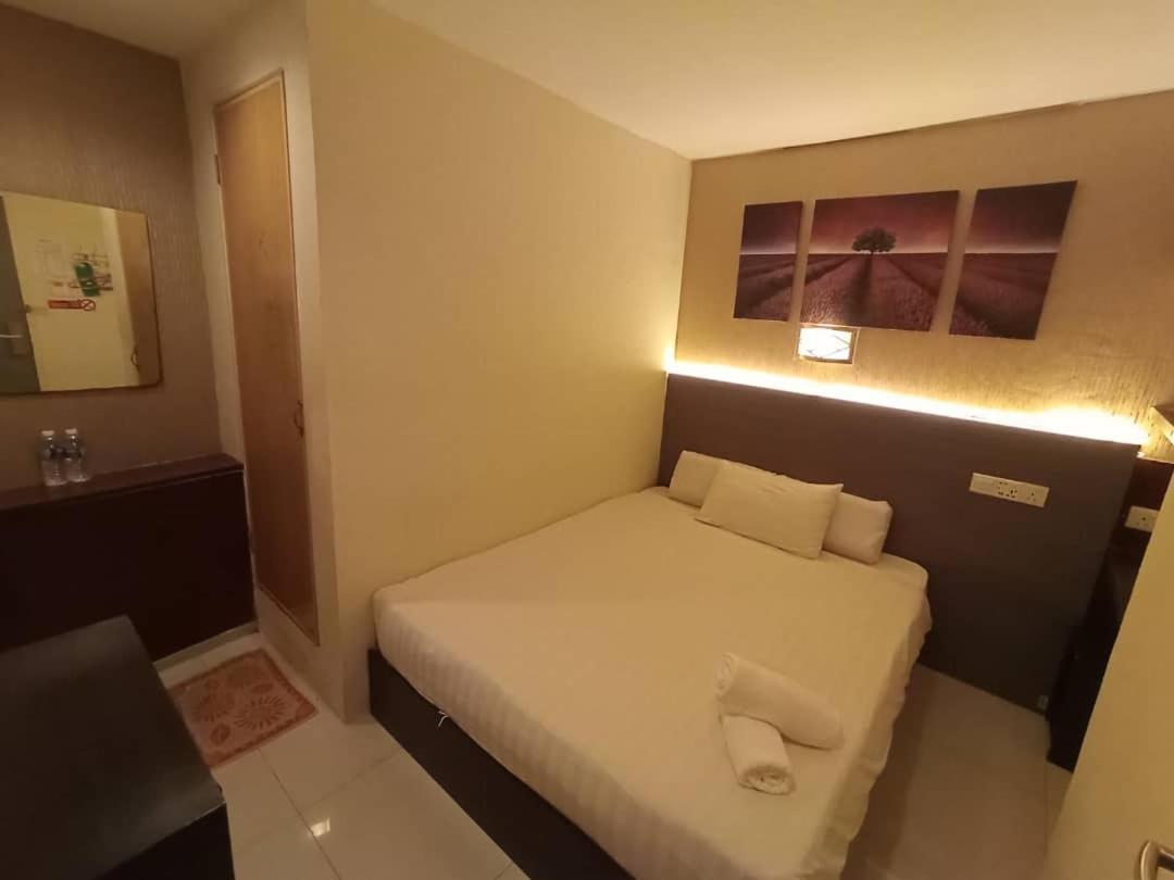 One Point Hotel Кучинг Экстерьер фото