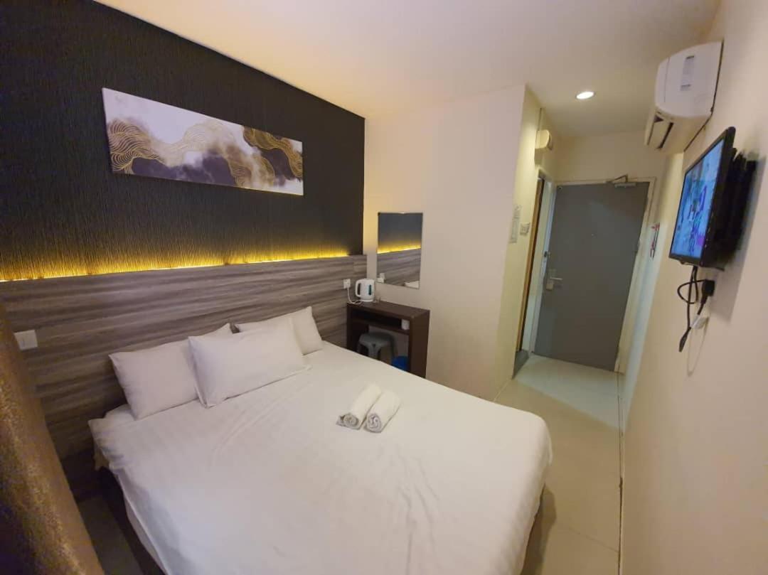 One Point Hotel Кучинг Экстерьер фото