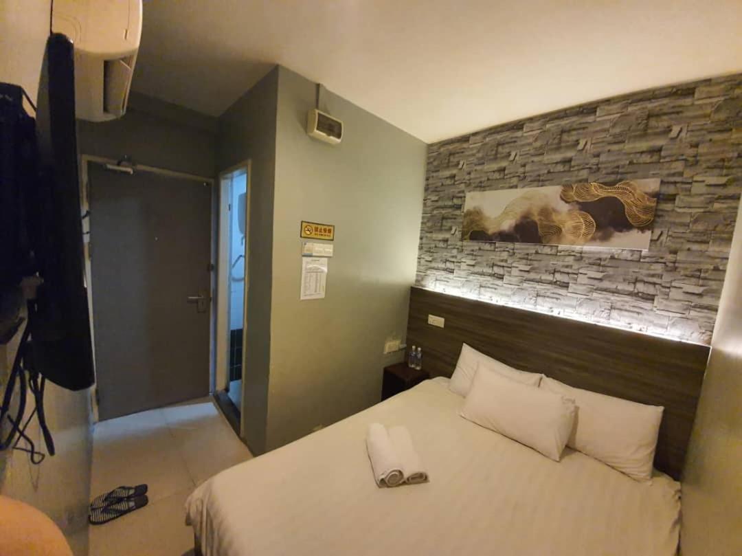 One Point Hotel Кучинг Экстерьер фото