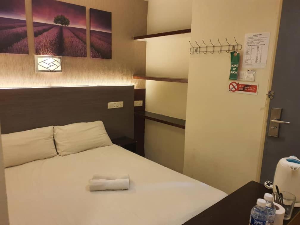 One Point Hotel Кучинг Экстерьер фото
