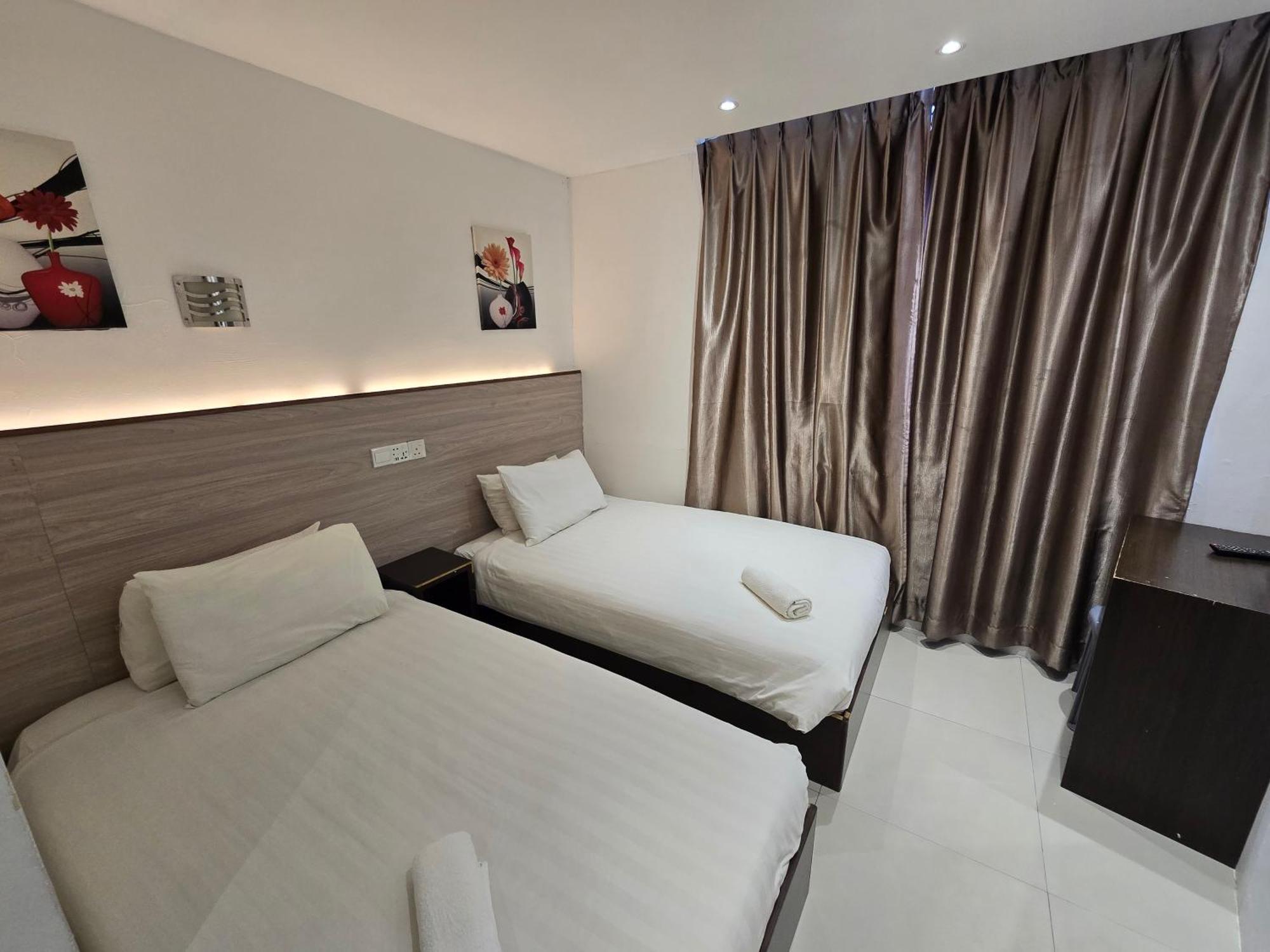 One Point Hotel Кучинг Экстерьер фото
